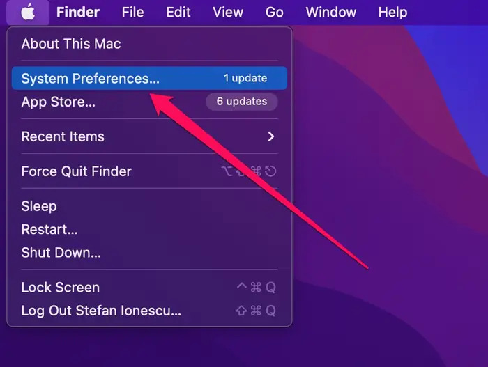 Bạn mở MacBook và chọn vào biểu tượng quả táo, rồi chọn “System Preferences”